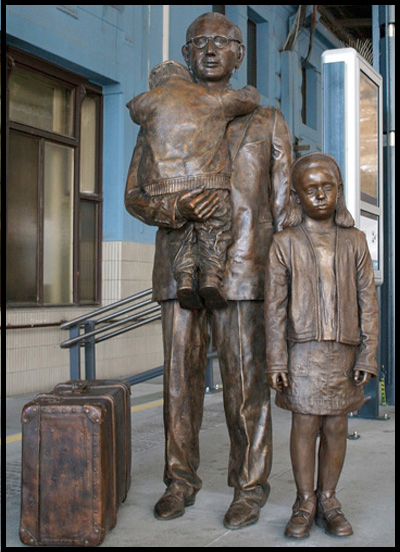 There is a statue of Sir Nicholas and two Kindertransport children on Platform 1 at the main railway station, Prague (Praha hlavní nádraží) created by sculptor Flor Kent.