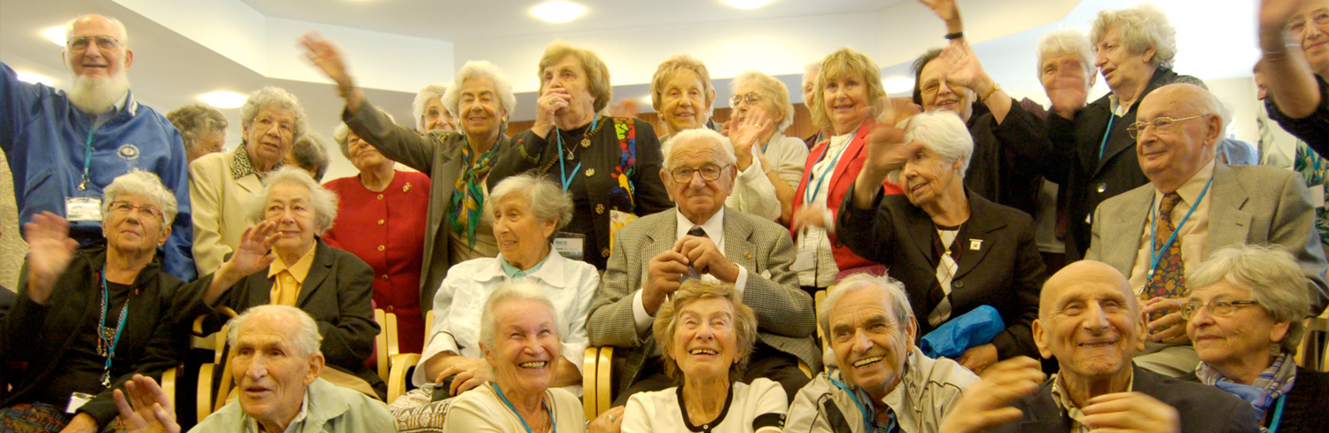 Sir Nicholas Winton with some of the children he rescued before world war 2
